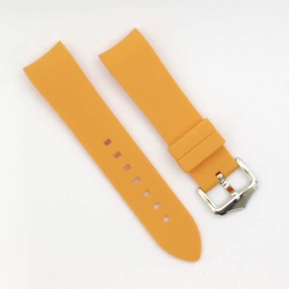 a yellow watch strap with a silver buckle