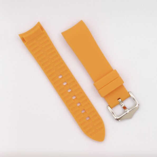 a yellow watch band with a silver buckle