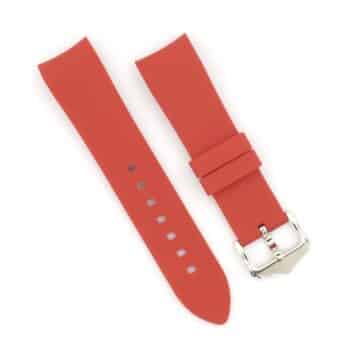 a red watch band with silver buckle